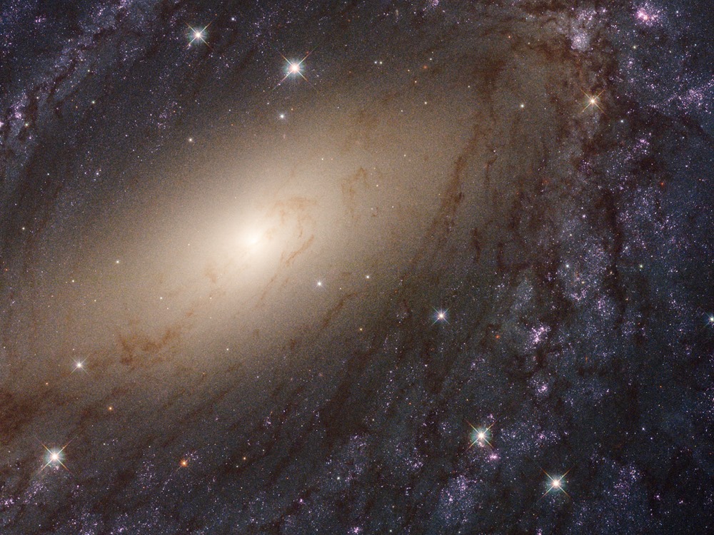 The glowing spiral arms of NGC 6744