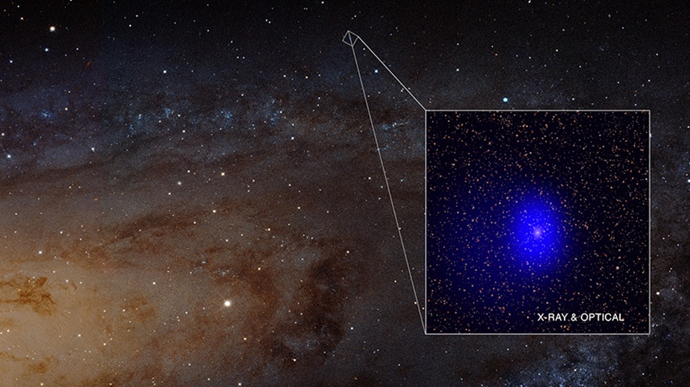 Giant Black Hole Pair Photobombs Andromeda Galaxy