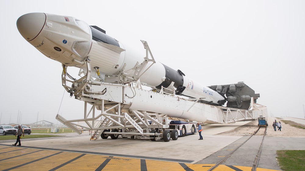 CAPE CANAVERAL, FL - FEBRUARY 28: In this NASA handout, A SpaceX Falcon 9 rocket with the company's Crew Dragon spacecraft onboard is seen as it is rolled out of the horizontal integration facility at Launch Complex 39A as preparations continue for the Demo-1 mission, Feb. 28, 2019 at the Kennedy Space Center in Florida. The Demo-1 mission will be the first launch of a commercially built and operated American spacecraft and space system designed for humans as part of NASA's Commercial Crew Program. The mission, currently targeted for a 2:49am launch on March 2, will serve as an end-to-end test of the system's capabilities (Photo by Joel Kowsky/NASA via Getty Images)