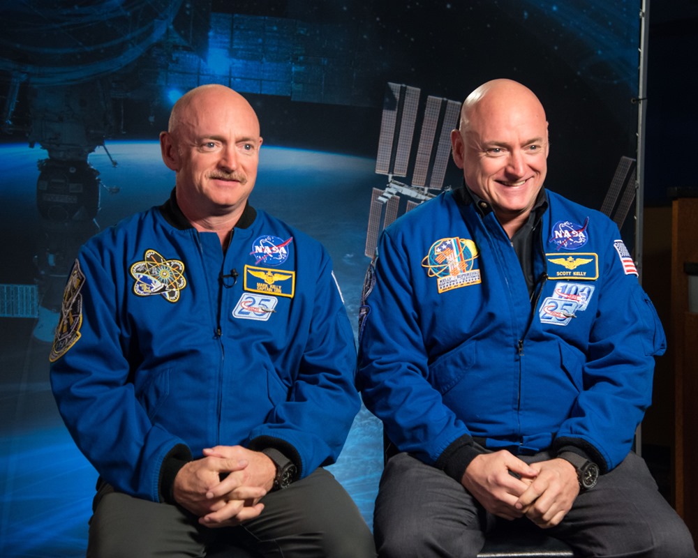 Expedition 45/46 Commander, Astronaut Scott Kelly along with his brother, former Astronaut Mark Kelly speak to news media outlets about Scott Kelly's 1-year mission aboard the International Space Station. Photo Date: January 19, 2015. Location: Building 2. Photographer: Robert Markowitz